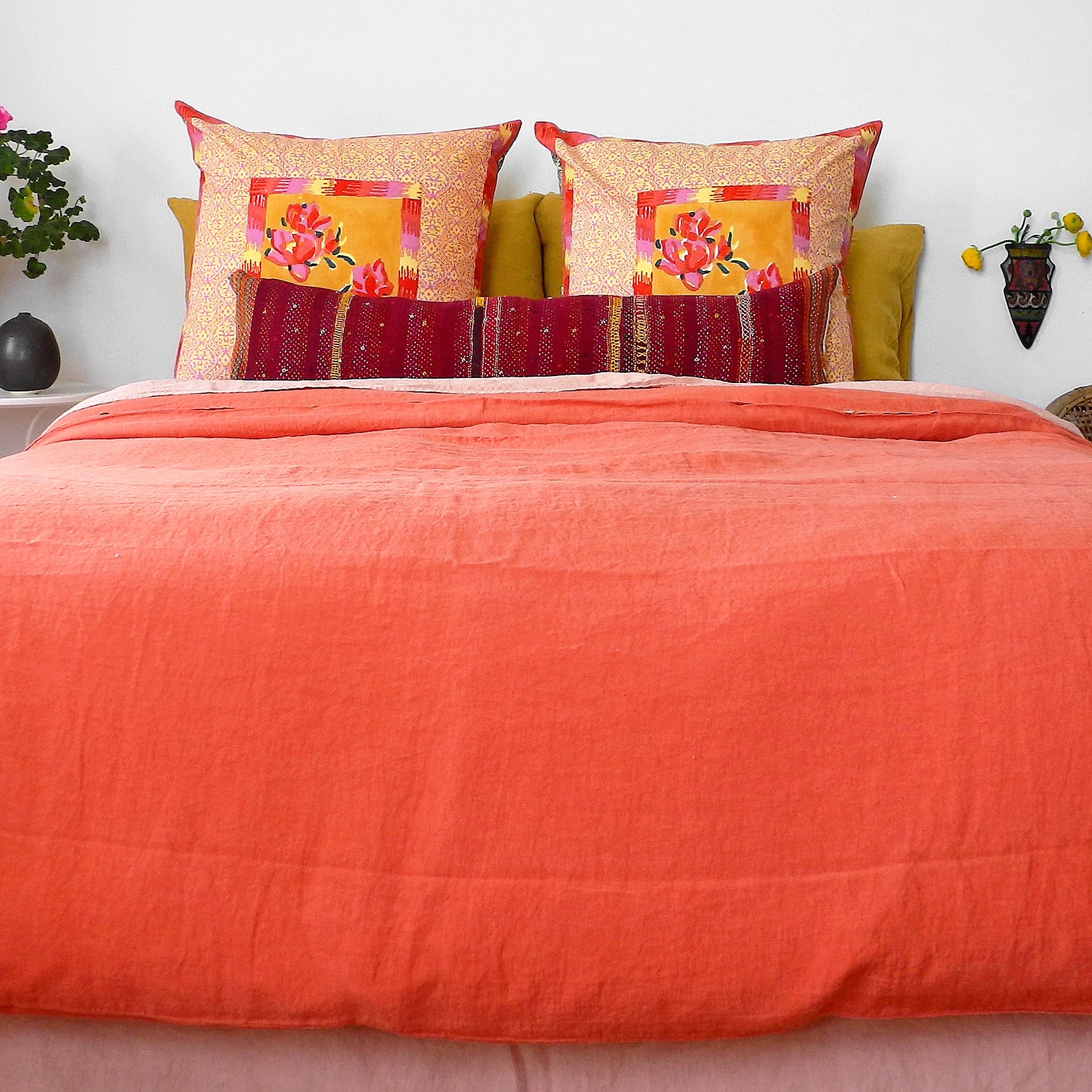 A Linge Particulier Linen Duvet in Terracotta gives a vibrant orange and sunset color to this duvet for a colorful linen bedding look from Collyer's Mansion