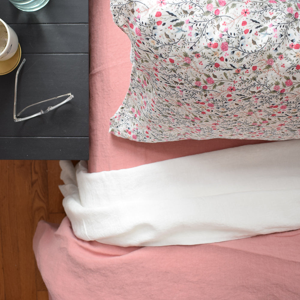 A Linge Particulier Linen Duvet in Lychee gives a deep salmon and old pink color to this duvet for a colorful linen bedding look from Collyer's Mansion