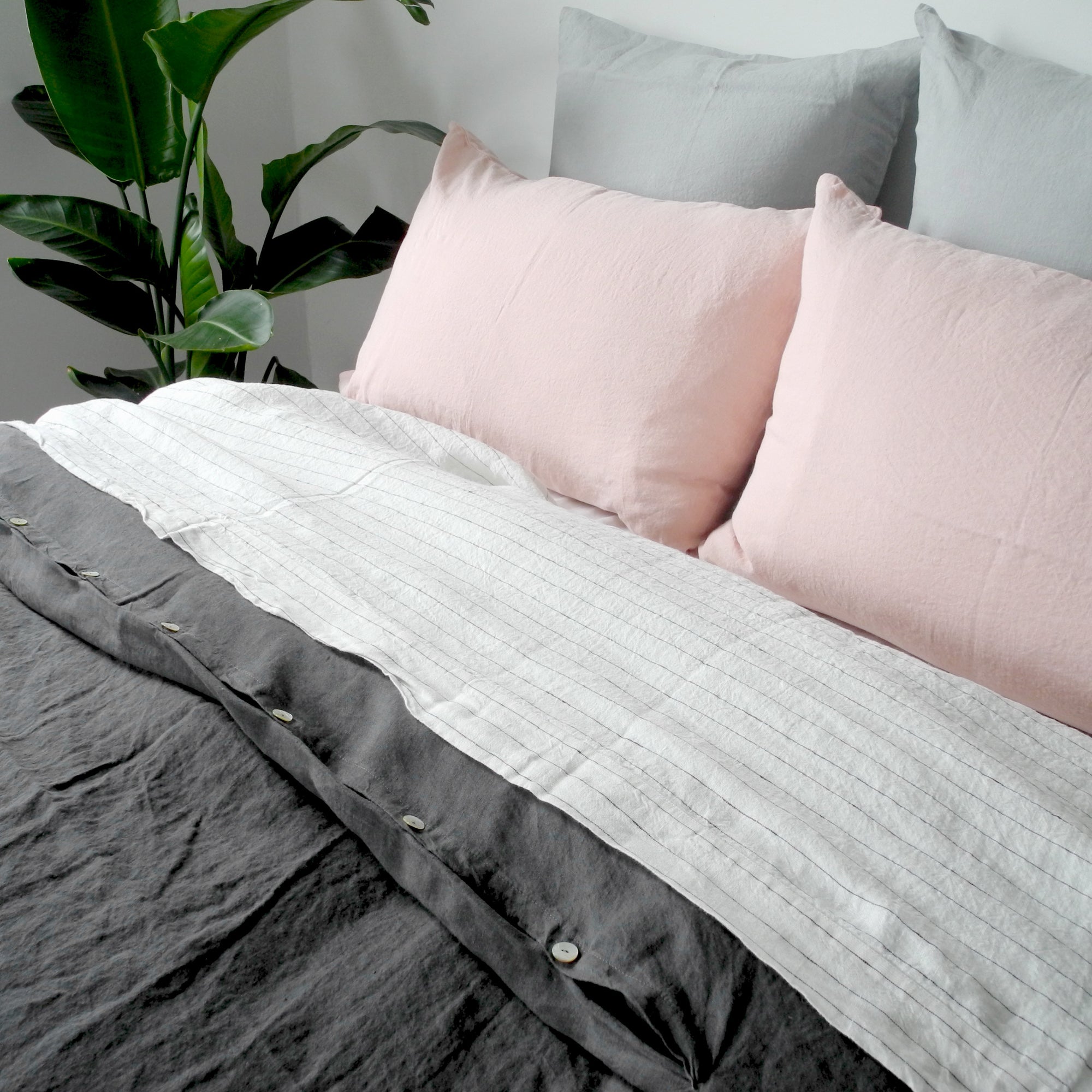 A Linge Particulier Linen Duvet in Storm Grey gives a charcoal and slate color to this duvet for a gray colorful linen bedding look from Collyer's Mansion