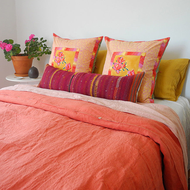 A Linge Particulier Linen Duvet in Terracotta gives a vibrant orange and sunset color to this duvet for a colorful linen bedding look from Collyer's Mansion